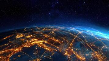 The globe illuminated by city lights and digital connections at night. photo