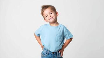 The cheerful boy with a playful smile and stylish casual outfit. photo