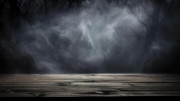 An empty wooden table in the dark with smoke coming from it photo