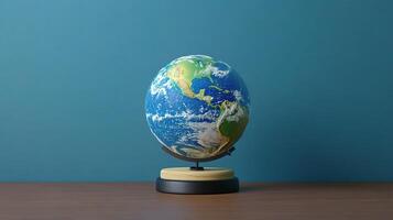 A globe on a wooden stand on a table photo