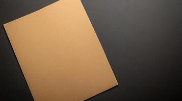 A piece of brown paper on a black surface photo