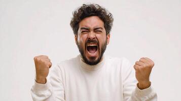 A man with a beard and white shirt is screaming photo