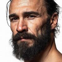 A man with a beard and a long hair photo