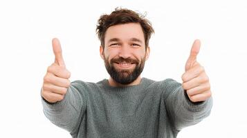 A man with a beard and a grey sweater is giving a thumbs up photo