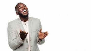 A man is laughing while standing up photo