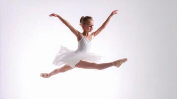 A young girl in a white dress is jumping photo