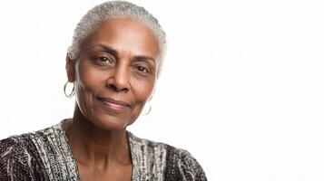 An older woman with gray hair and a white background photo