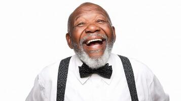 An older man with a white shirt and bow tie laughing photo