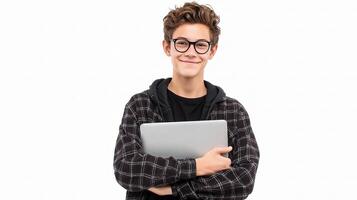 A boy with glasses holding a laptop photo