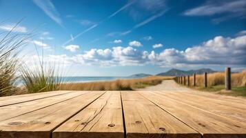 Wooden table on the beach with blue sky and clouds image. photo