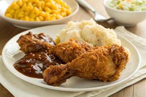 fried chicken, mashed potatoes, and corn on the cob photo