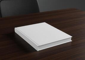 White book on table with black chair photo