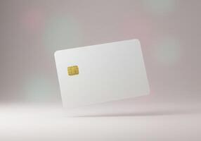 A white credit card on a table with a blurred background photo