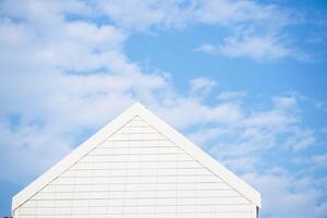 White building architecture and blue sky, bright sunlight, abstract background photo