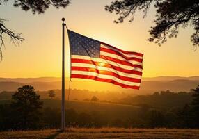 American flag flying in the sunset photo