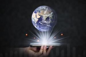 Earth and smart phone represent e-learning online in the digital age Knowledge education. Earth day. Energy saving and Learning concept, Elements of this image furnished by NASA photo