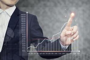 Stock trading charts display financial data graphs on digital screens. photo