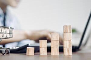 Businessmen are checking stock and checking customer database Concepts of e-commerce system management, cost and revenue management of businesses Monitoring of online shopping balance for home workers photo