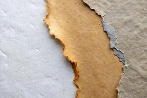 Abstract Torn Paper Texture Background with Layers and Rough Edges photo