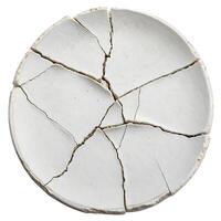 Fragile State, Top-Down View of a Severely Cracked White Plate, Studio Shot photo