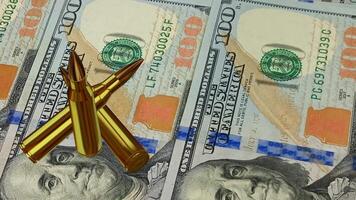 Movement Over 100 Dollar Bills, Banknotes, Ammunition, Cartridge, Bullet, Exclusive, Military Background video