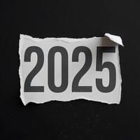 The Year 2025 on Torn Paper, A Symbol of New Beginnings and the Future photo
