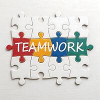 Teamwork concept. Connecting puzzle pieces. Symbol of integration photo