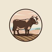 Cow in a field logo design vector