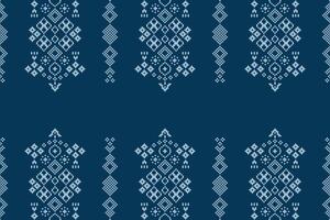 Fabric pattern blue background color wallpaper with ethnic pattern decor art cross stitch. vector