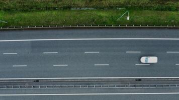 filming from a bird's eye view of car traffic on a section of the road. Top view, shooting from a quadrocopter - section photo