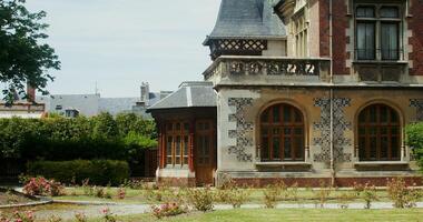 Close-up of a beautiful mixed sptley historic building. Traditional houses of Normandy. F camp, France. 4k , red komodo photo