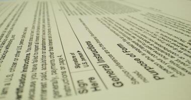The form of the taxpayer's documents. The pen is on the paper. Close-up photo