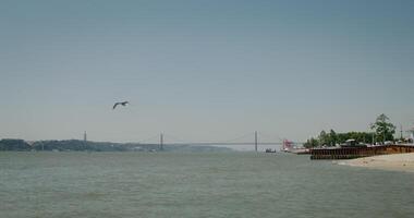Panoramic view of the hanging bridge in Portugal over the Tagus River photo