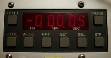 Timer in a professional tape recorder while recording studio sounds. Close-up of the screen with the countdown - screen photo