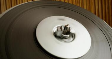 Sound recording on a tape recorder in a recording studio. Fast movement of the magnetic tape, close-up - magnetic photo