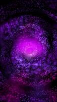 A purple smoky spiral galaxy rotates, smoothly changing perspective, sending impressive waves into space. video