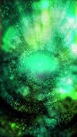 A green, smoky spiral galaxy rotates, smoothly changing perspective, sending impressive waves into space. video