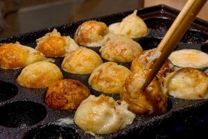 cooking Takoyaki street food photo