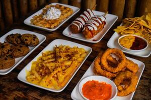 a table with a variety of food items on it photo