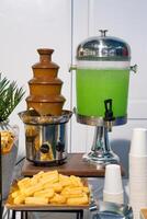 a table with a chocolate fountain photo