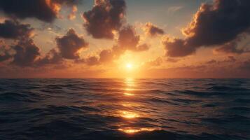 A breathtaking sunset over the ocean with dramatic clouds photo