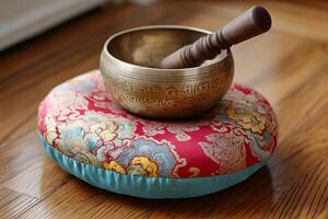 Tibetan singing bowl on meditation cushion peaceful tone photo