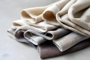 Soft folds of neutral toned fabrics with a flowing texture photo