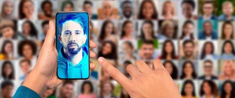A person uses a smartphone to scan their face for identification. The device displays a digital portrait of the user. photo