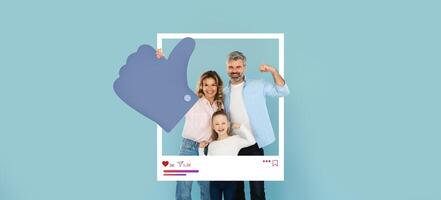 A family of three enjoys a moment of joy with a thumbs up gesture in front of a light blue background. They showcase their enthusiasm for social media content and online interaction. photo