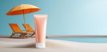 A tube of sunscreen stands prominently on soft sand, reflecting a commitment to sun safety. photo