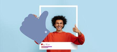 An individual expresses excitement by giving a thumbs up within a playful social media-inspired frame. The background is a soft blue, adding to the upbeat atmosphere. photo