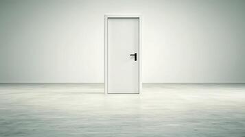A minimalistic white door stands alone in a spacious, empty room with gray walls and floor photo