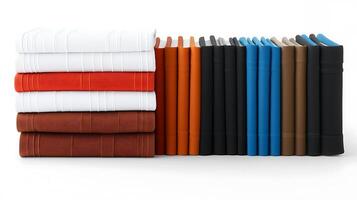 A neatly arranged stack of colorful books in various shades on a clean, white background photo
