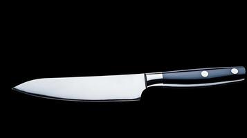 A sleek kitchen knife with a polished blade and black handle, ideal for culinary tasks photo